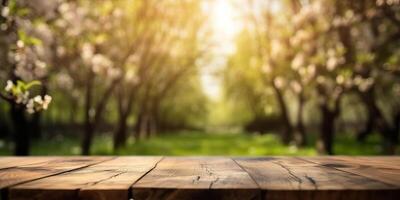 Empty wooden table in spring garden blurred background, Free space for product display. photo