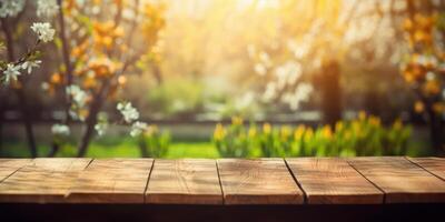 Empty wooden table in spring garden blurred background, Free space for product display. photo