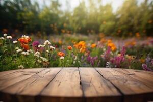 Empty wooden table in flowers garden blurred background, Free space for product display. photo