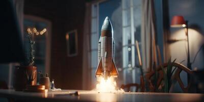 Business start up concept with rocket launching in workplace. photo