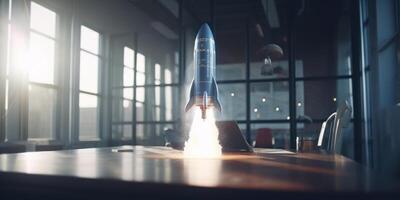 Business start up concept with rocket launching in workplace. photo