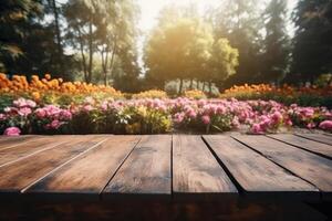 Empty wooden table in flowers garden blurred background, Free space for product display. photo