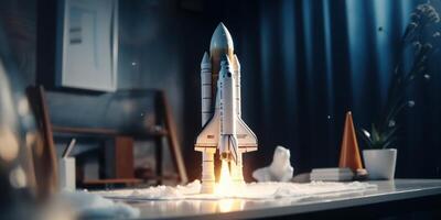 Business start up concept with rocket launching in workplace. photo