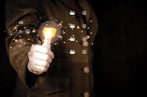 Businessman pressing virtual button on a touch screen. Document Management System. photo