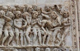 Orvieto, Italy, September. Detail in relief at the facade of the Cathedral of Orvieto. Italy. photo