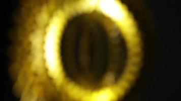 an abstract gold shiny spinning pattern, great for backdrops, parties and events video