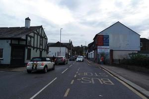 Low Angle View of British Road and Traffic at Luton Town of England UK. The Image Was Captured at Central Luton  City During a Cold and Cloudy Evening of 24-March-2023 photo