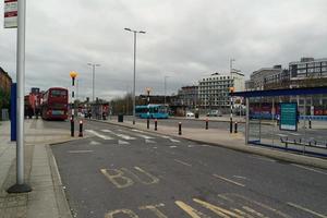 Low Angle View of Luton Central Bus Station at Main Railway Station of Downtown Luton City of England Great Britain. The Image Was Captured on 01-April-2023 on Cloudy and Cold Evening photo