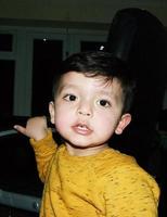 Cute Asian Pakistani Baby, Ahmed Mustafain Haider is Posing at Home. Originally he is from Pakistan but Live at Luton England UK. Image was Captured on 02-April-2023 photo