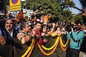 New Delhi, India - January 16 2023 - Thousands of people collected during Prime Minister Narendra Modi BJP road show, people during PM Modi big election rally in the capital photo