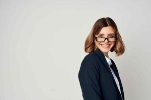 Business woman wearing short haired glasses emotions light background photo