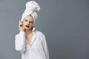 woman white shirt cosmetics with towel on head Lifestyle posing photo