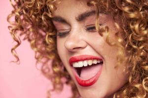 Attractive woman Curly hair closed eyes open mouth close-up charm photo