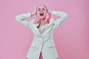 Pretty young female attractive look white blazer pink wig color background unaltered photo