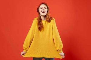 woman in yellow sweater with red headband modern style hipster accessories photo