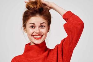 portrait of a woman in a red sweater Lifestyle Studio fun model photo