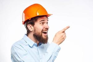 engineer in orange hard hat safety work construction industry photo