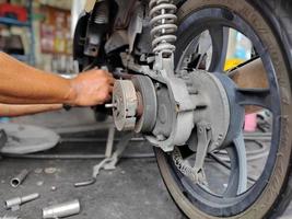 reparar motocicletas, conceptos mantenimiento de motos foto