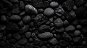 Rough Grainy Stone Texture Background in Dark Grey and Black photo