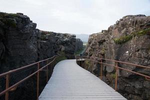 Bridge and walking path at Thingvellir, Iceland photo