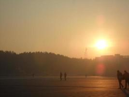 Sunrise at the beach of the Bay of Bengal, Bangladesh. Travel and Vacation. photo