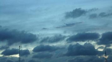 Beautiful clouds in the sky at sunset moment in a town in Bangladesh, Asia photo