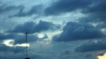 Beautiful clouds in the sky at sunset moment in a town in Bangladesh, Asia photo