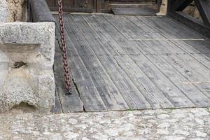 wooden drawbridge in medieval castle photo