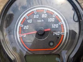 A close up of honda scoopy speedometer photo