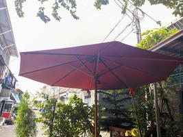 a big red umbrella for the table photo