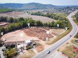 vacant land management land reclamation for land plot for building house aerial view, land pins location for housing subdivision residential development owned sale rent buy or investment home expand photo