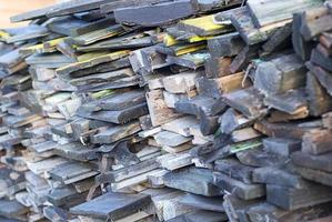 Stack of wooden boards from the dismantled house photo