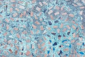 abstract texture of concrete wall with random mosaic pattern photo