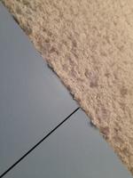 Fluffy surface. Flake surface. Fluffy cereal background photo
