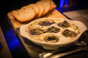 Escargot with french bread photo