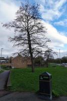 Low Angle View of Local Public Park. The Image Was Captured at Wardown Public Park of Luton Town of England UK During a Cold and Cloudy Evening of 24-March-2023 photo