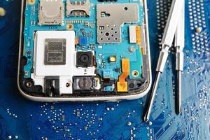 Repairing and upgrade mobile phone, electronic, computer hardware and technology concept. photo