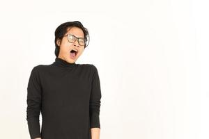 Yawning Gesture Of Handsome Asian Man Isolated On White Background photo