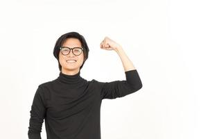 Showing strength arm Of Handsome Asian Man Isolated On White Background photo