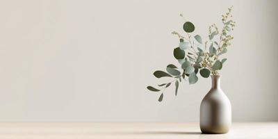 Beautiful eucalyptus flower in ceramic vase on table with white background. Copy space. photo