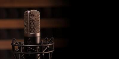 Studio Podcast Microphone on Dark Brown Background photo