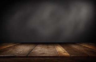 Wooden texture table top on dark background photo