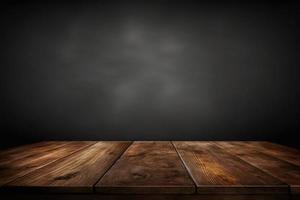 Wooden texture table top on dark background photo