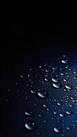 water drops on dark blue background photo