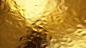 Gold foil metallic wrapping paper texture background photo