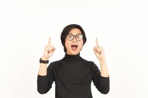 Showing Product and Pointing Up Of Beautiful Asian Man Isolated On White Background photo