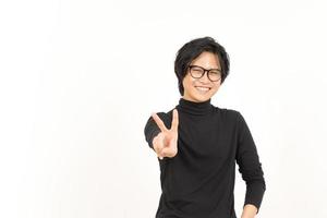 Smile and Showing Peace Sign Of Handsome Asian Man Isolated On White Background photo