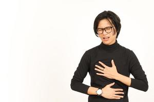 sufrimiento dolor de estómago gesto de hermoso asiático hombre aislado en blanco antecedentes foto