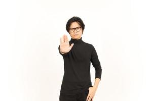 Stop Rejection Hand Gesture Of Handsome Asian Man Isolated On White Background photo