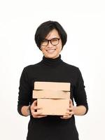 Holding Package Box or Cardboard Box Of Handsome Asian Man Isolated On White Background photo